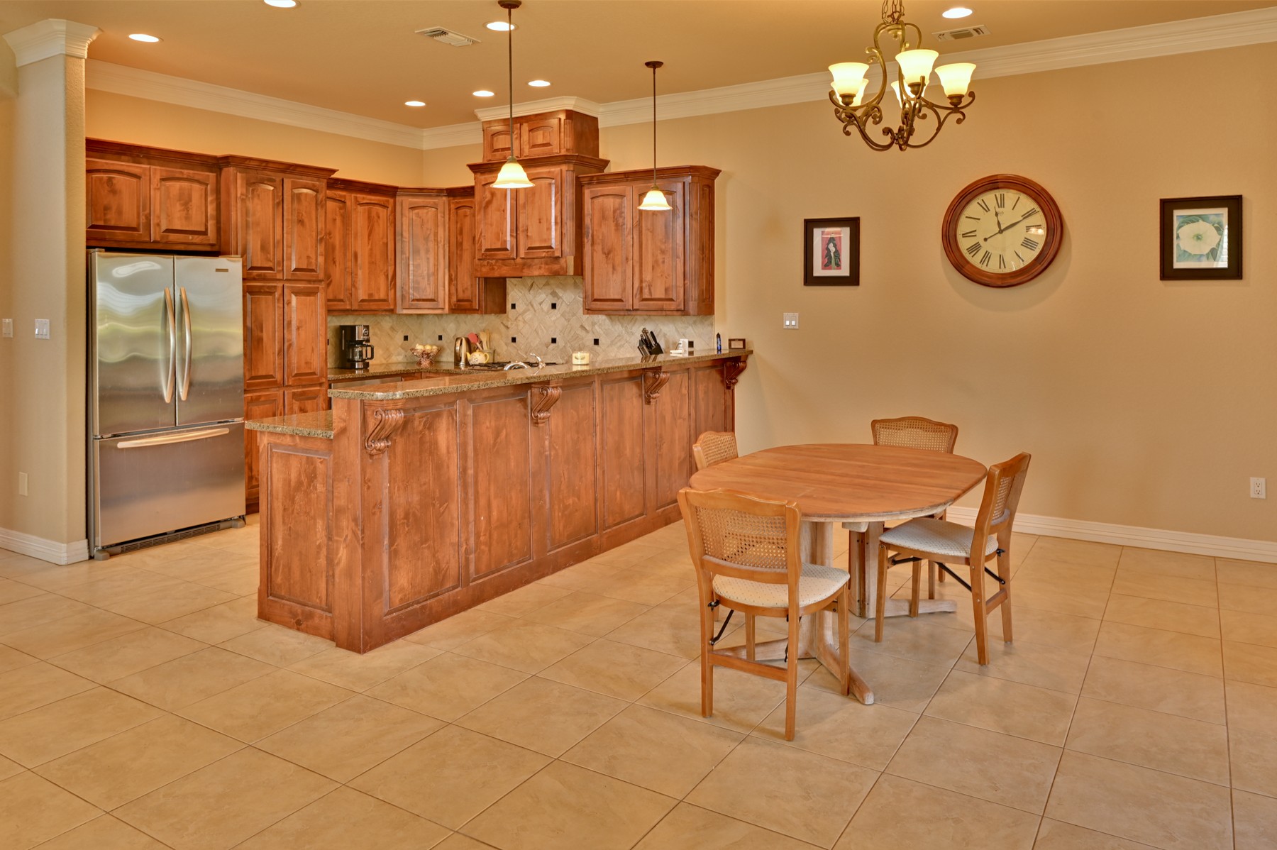 Kitchen and dining area before virtual staging with original table and chairs